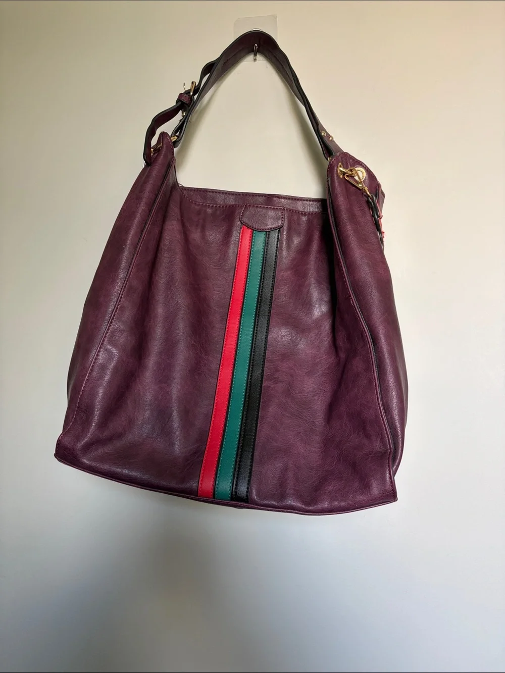 Large Burgundy leather bag with red and green accents